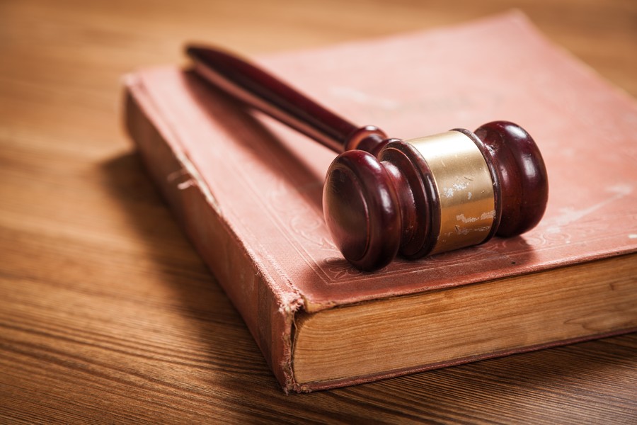 捍衛正義之路:上海刑事案件律師探討資敵罪案件中被告人的辯護權